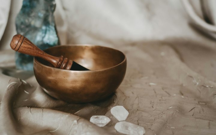 brown wooden bowl on white textile